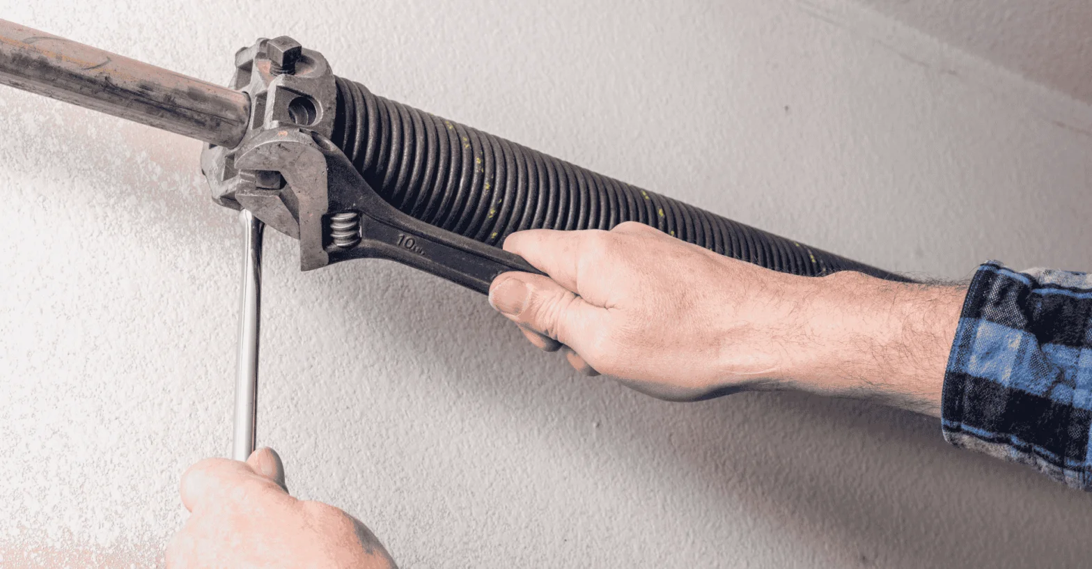 man fixing the spring